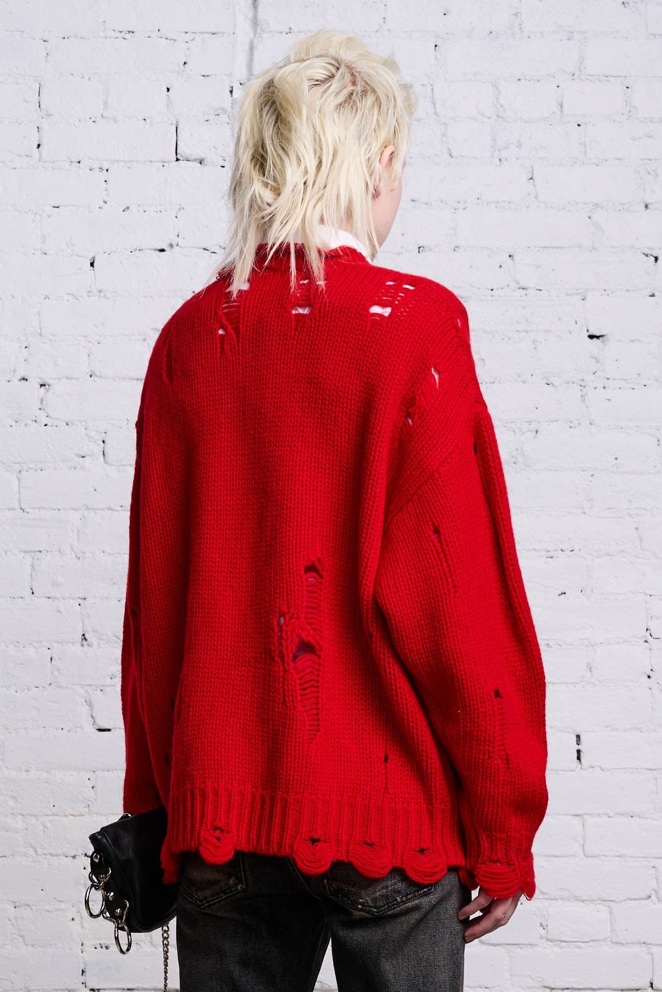 Distressed red sale sweater